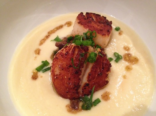 scallops sauteed in brown butter with mushroom pickle served over a coliflour & leek potage